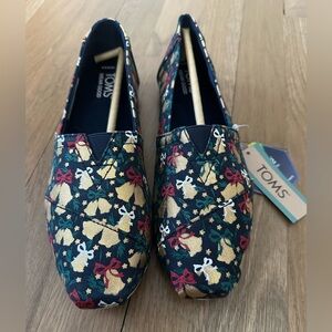 TOMS Gold Bow Holiday Patterned Slip-On Shoes